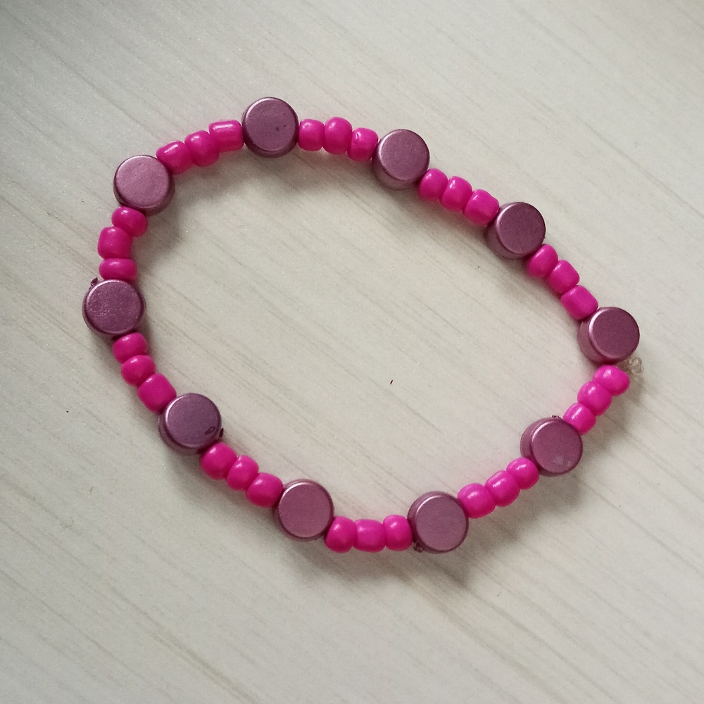 hand crafted Pink beaded geometric statement bracelet
